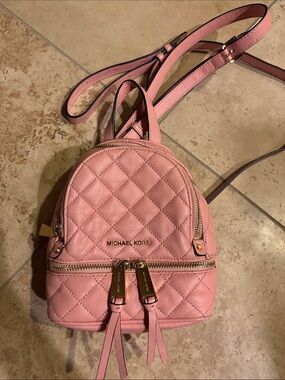 Michael Kors Quilted Pink Mini Backpack Crossbody